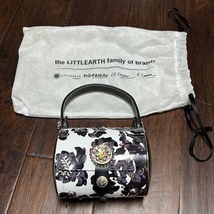 Little Earth metal wrist bag